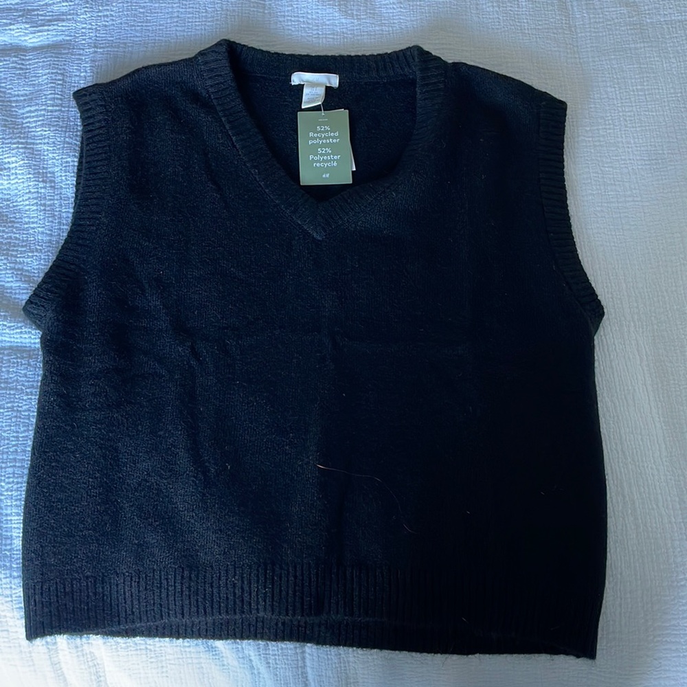 Black sweater vest